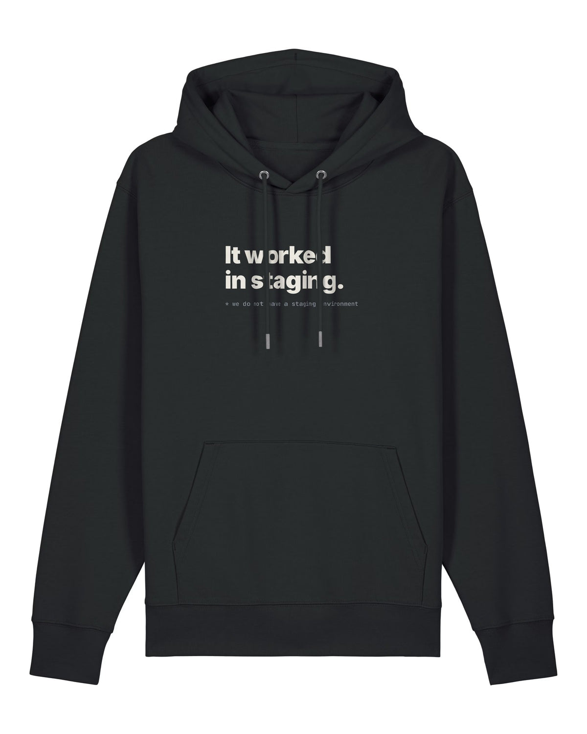 Black hoodie with "It worked in staging." with a footnote about having no staging environment
