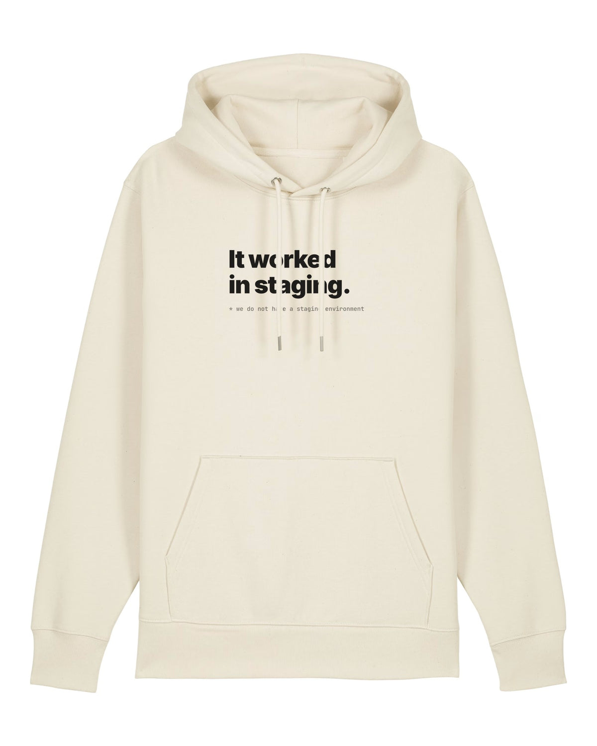 White hoodie with "It worked in staging." with a footnote about having no staging environment