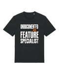Black t-shirt with "UNDOCUMENTED FEATURE SPECIALIST" with a small orange bug