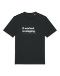 Black t-shirt with "It worked in staging." with a footnote about having no staging environment